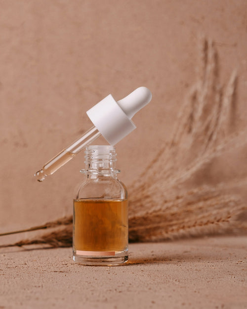 24K Gold Face Serum 50ml, amber dropper bottle
